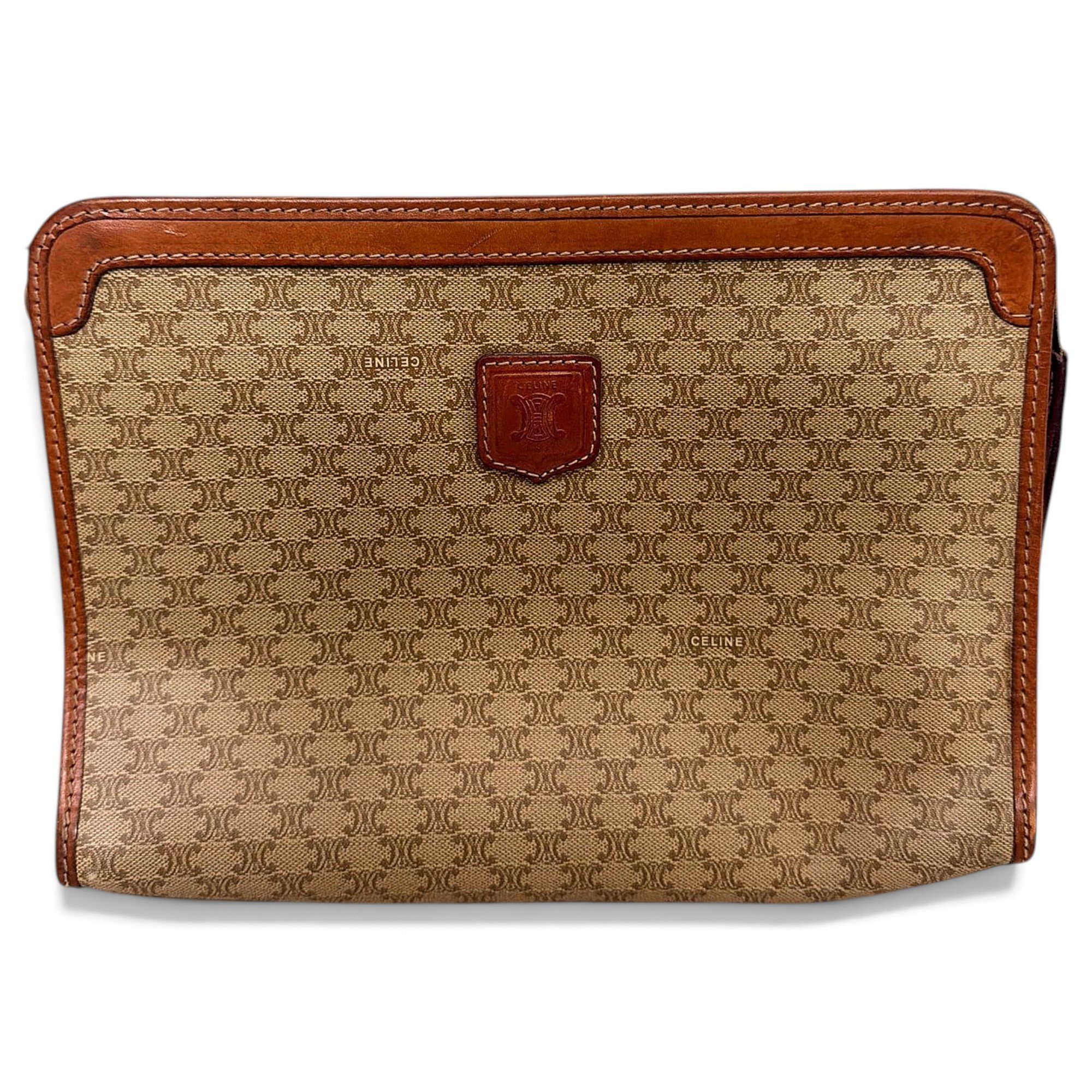 Triomphe Vintage leather clutch bag