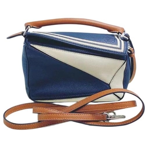 Puzzle leather handbag