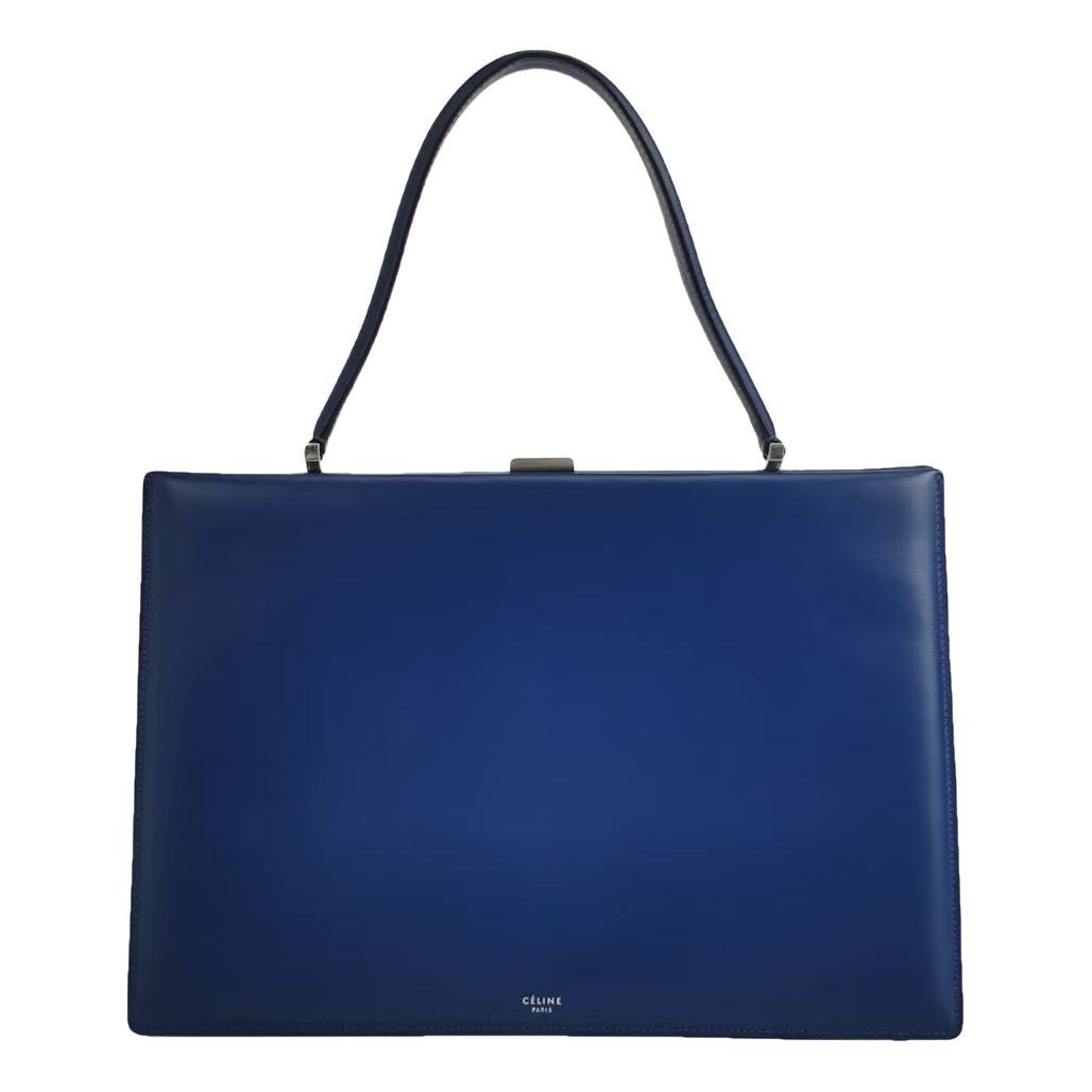 Clasp leather handbag