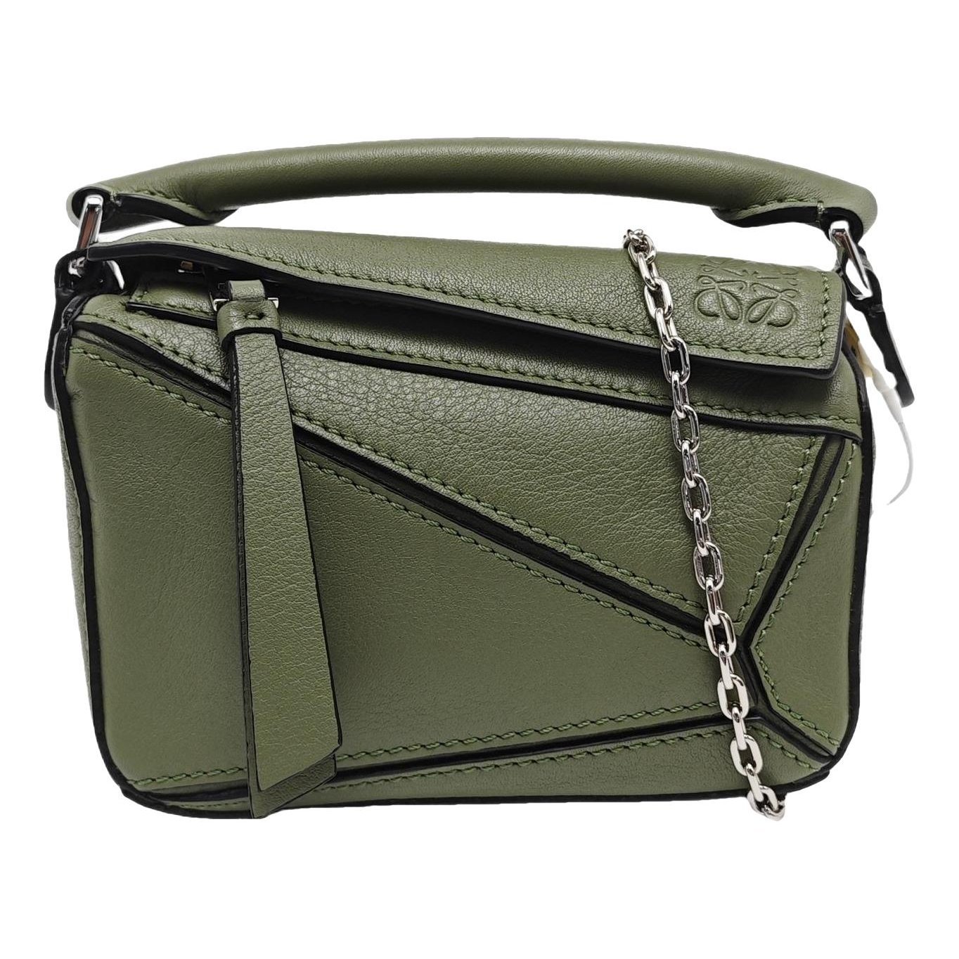 Puzzle leather handbag
