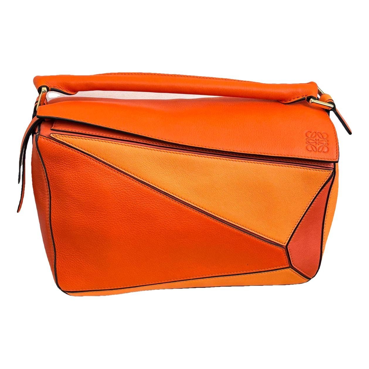Puzzle leather handbag