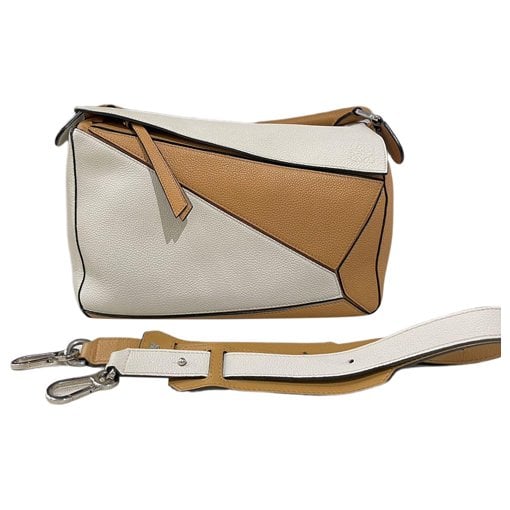 Puzzle leather crossbody bag