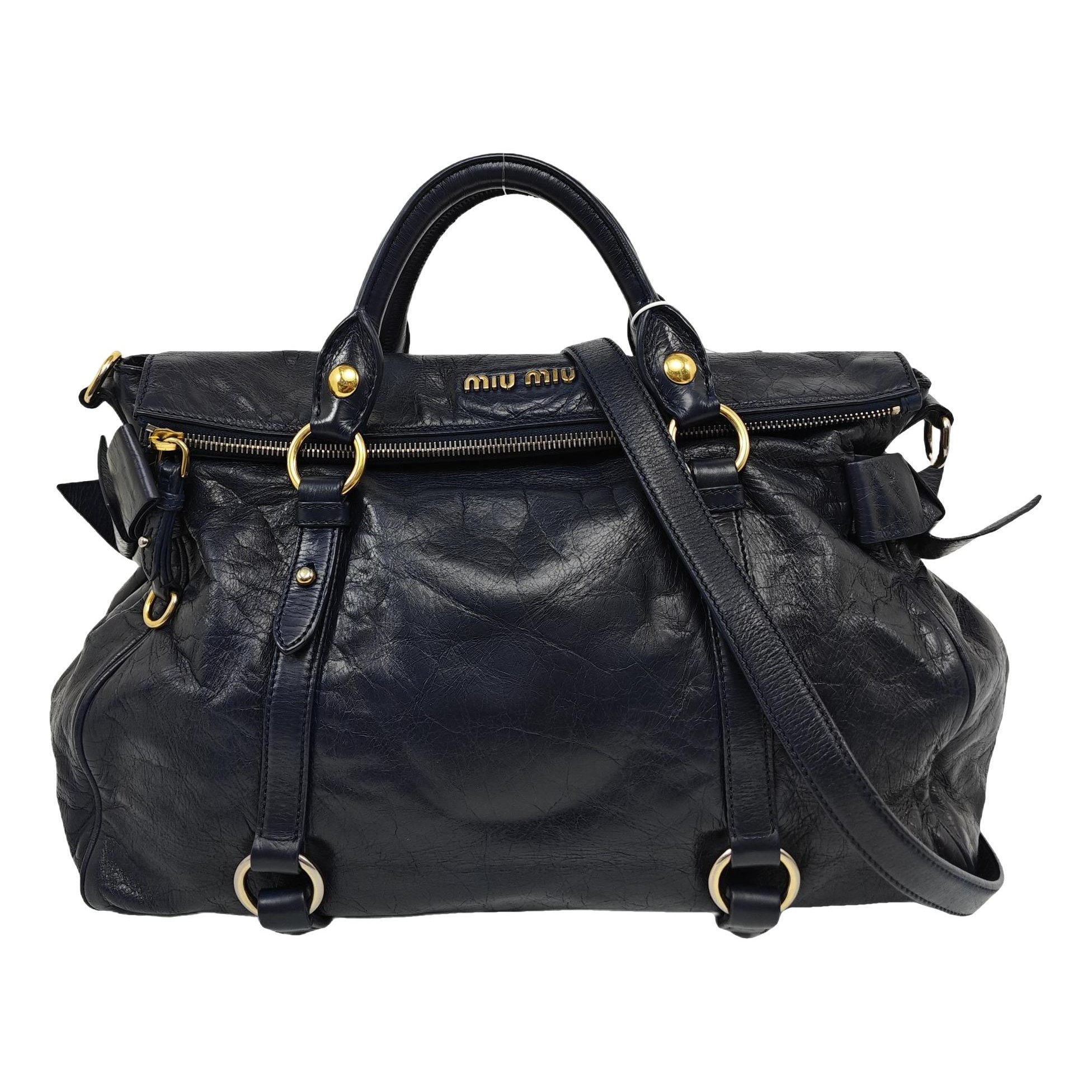Bow bag leather handbag