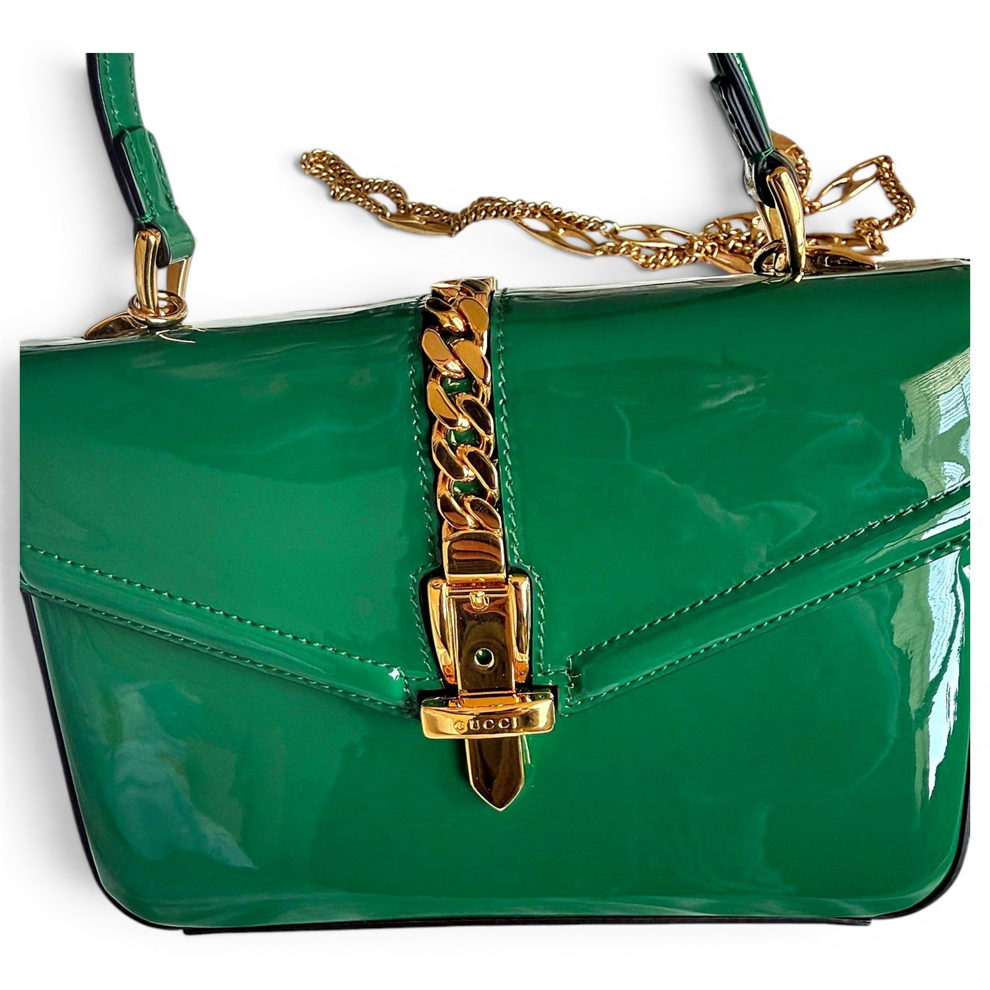 Patent leather clutch bag