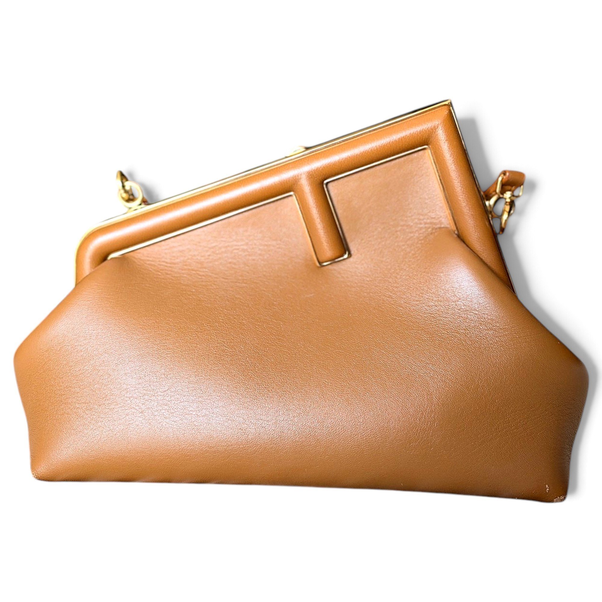First leather handbag