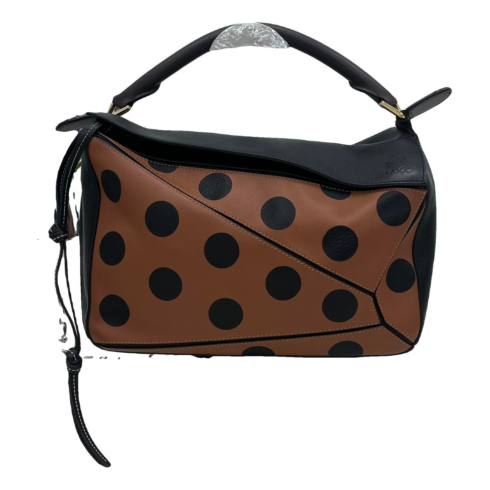 Puzzle leather handbag