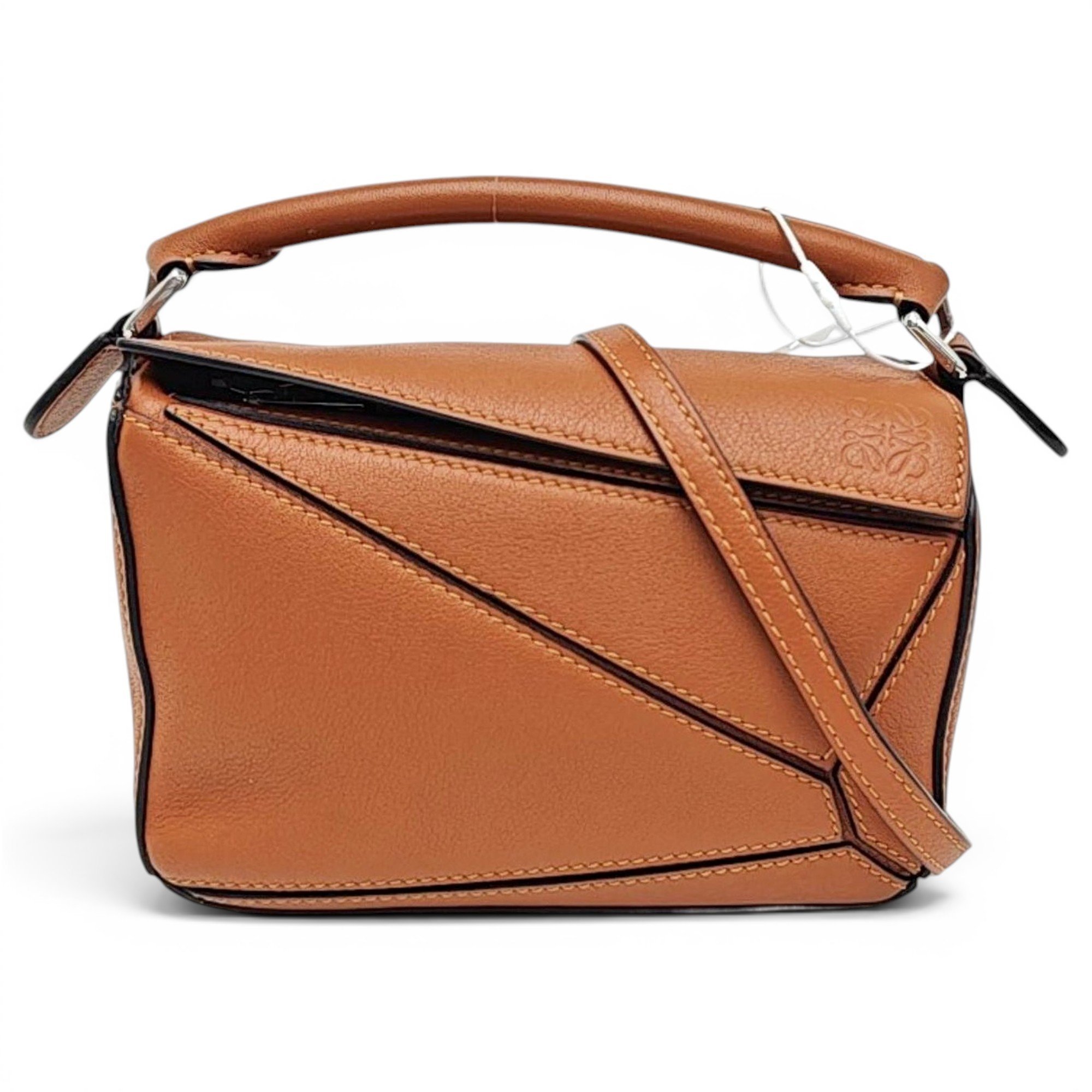 Puzzle leather handbag