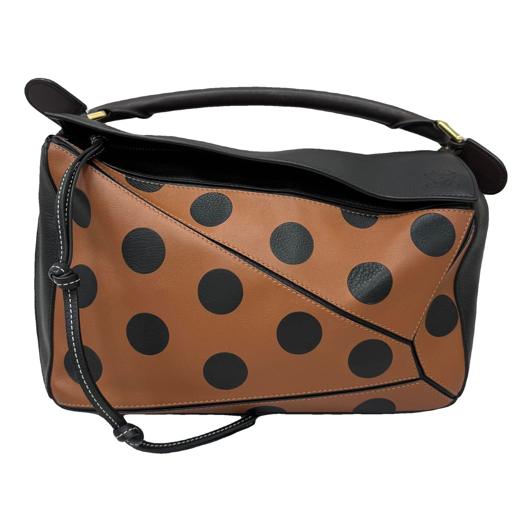 Puzzle leather handbag