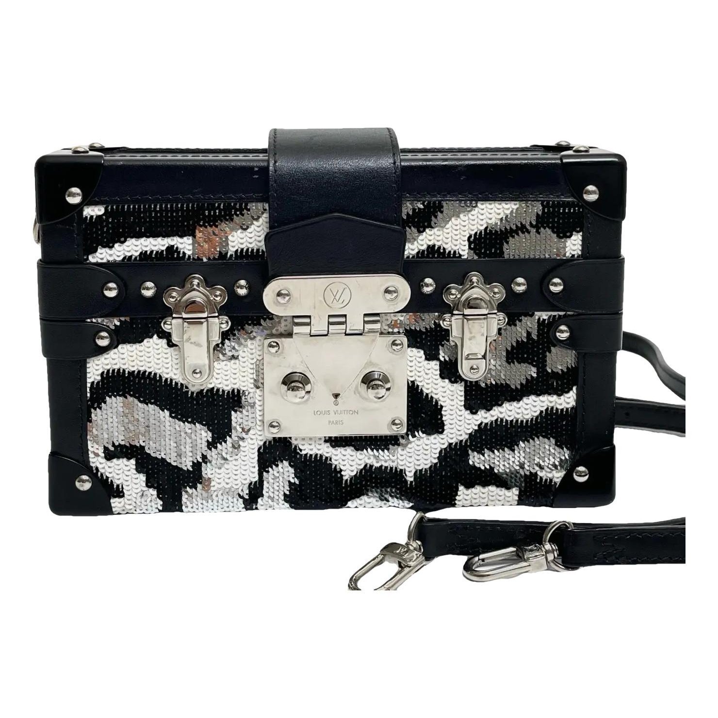 Pochette Trunk leather handbag