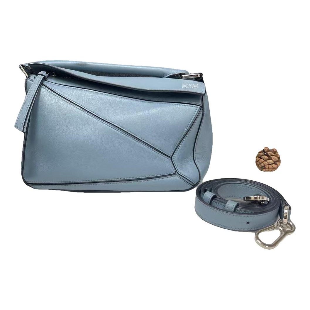 Puzzle leather handbag