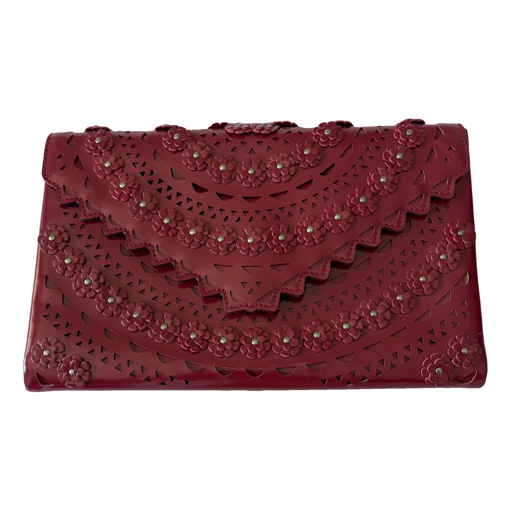 Patent leather clutch bag