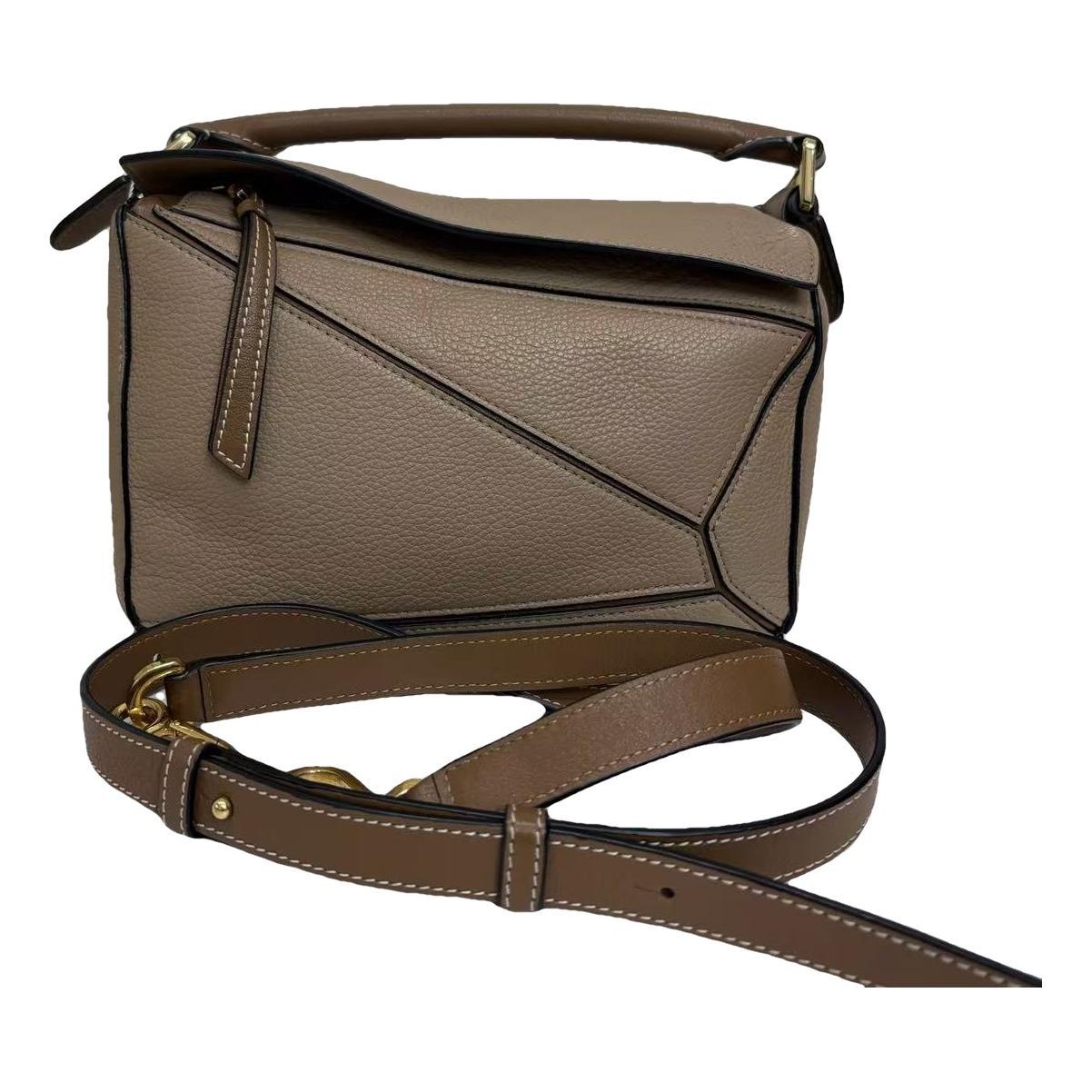 Puzzle leather handbag