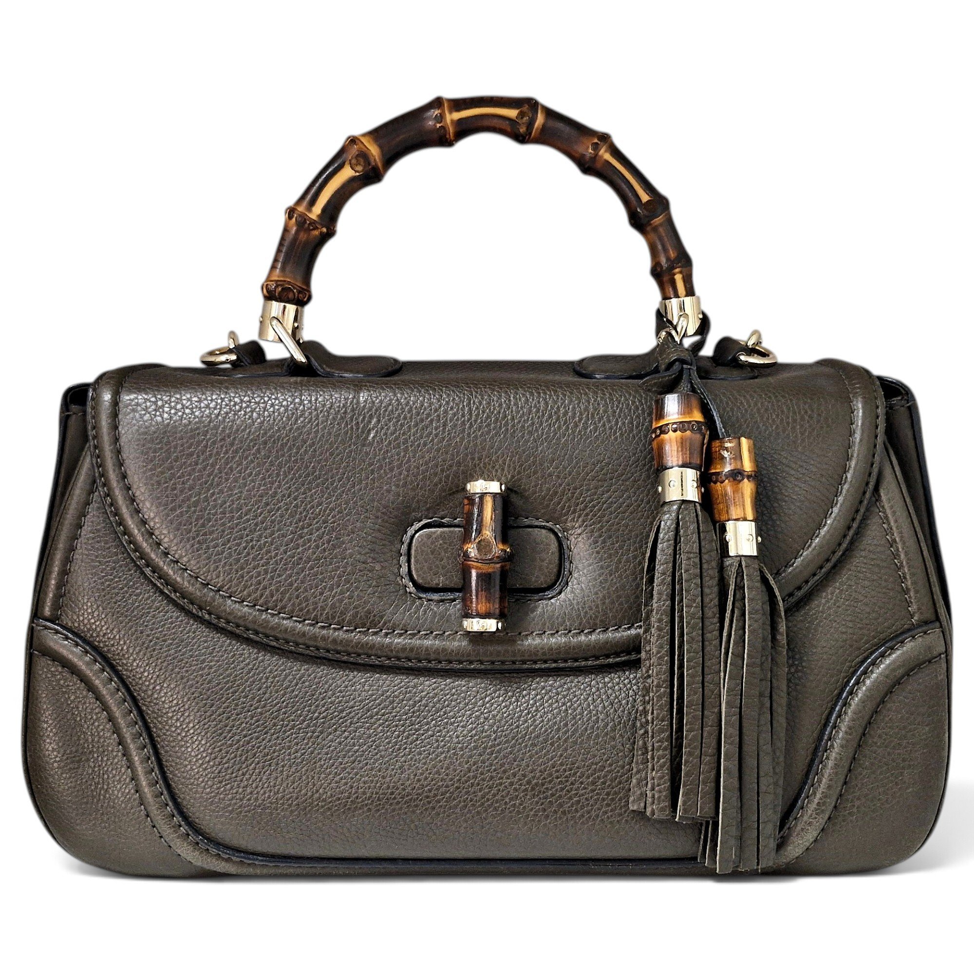 Convertible Pompon Bamboo Top Handle leather handbag