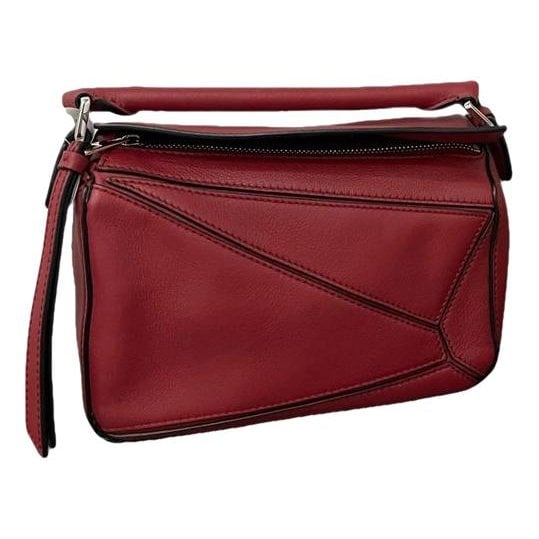 Puzzle leather handbag