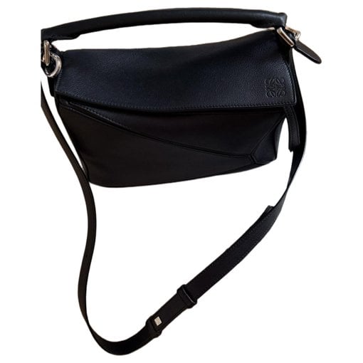 Puzzle leather handbag