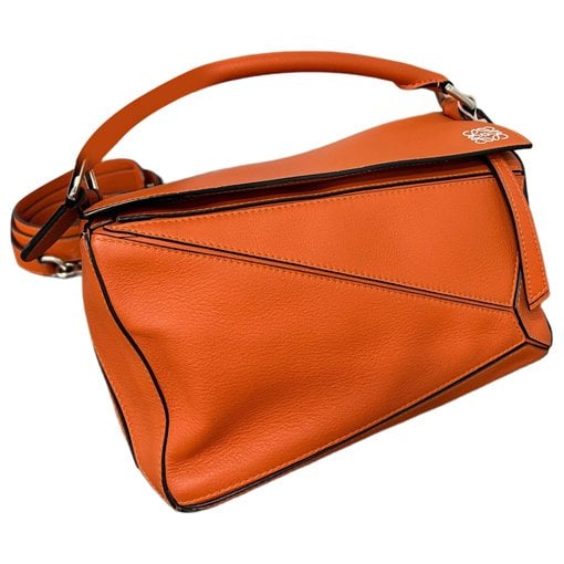 Puzzle leather handbag