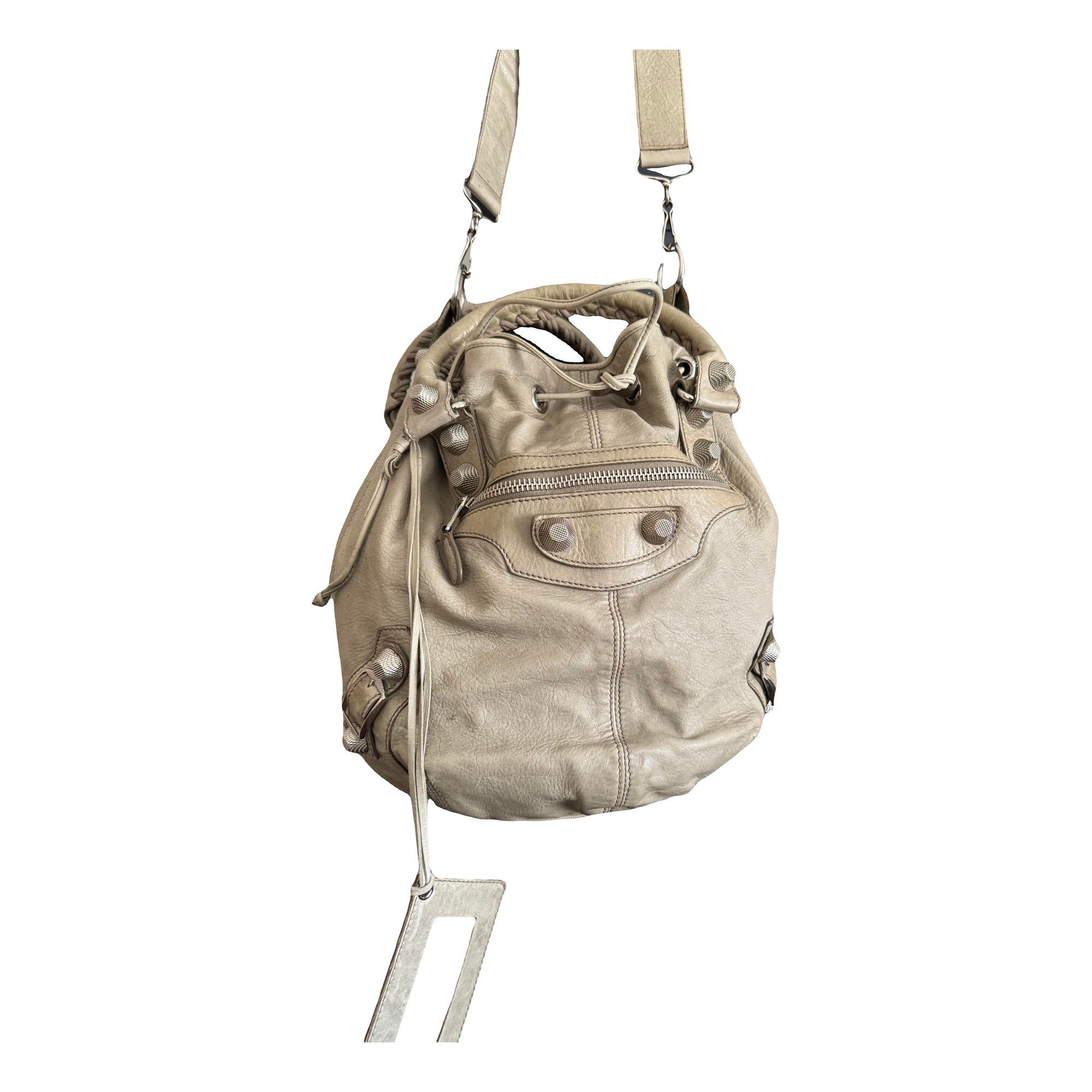 Pompon leather bag