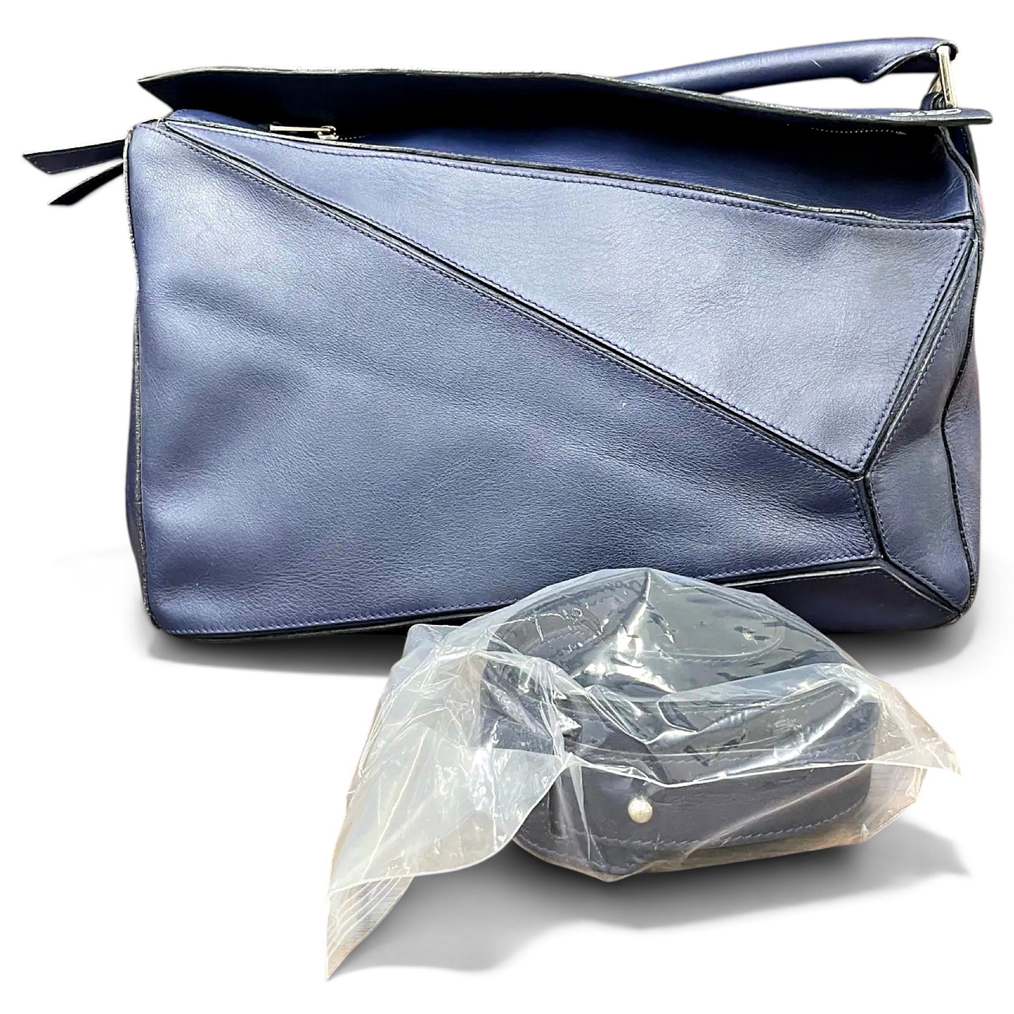 Puzzle leather handbag