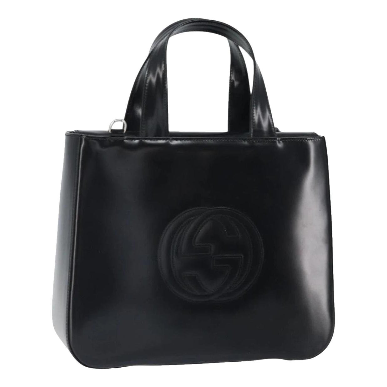 Patent leather handbag