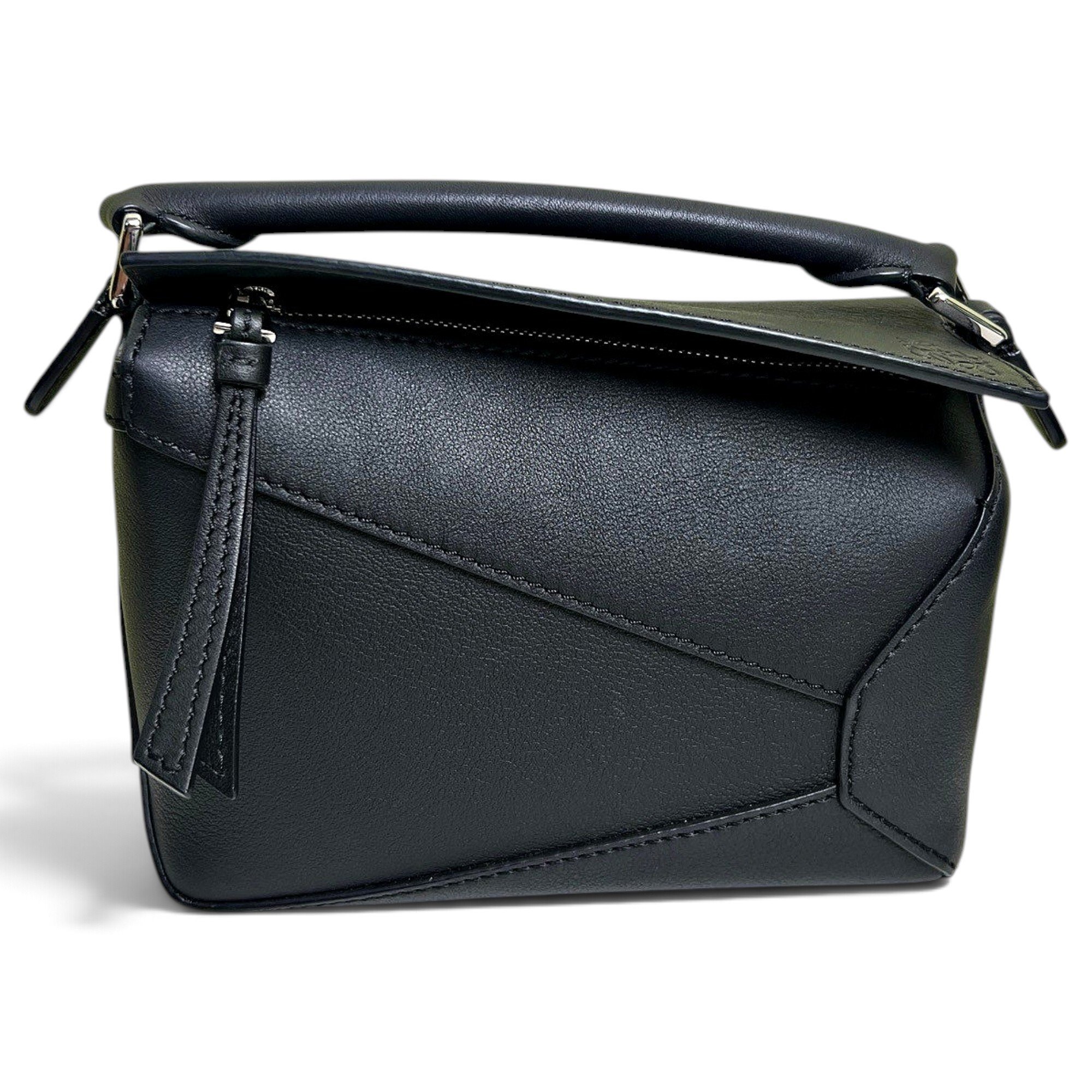 Puzzle leather handbag
