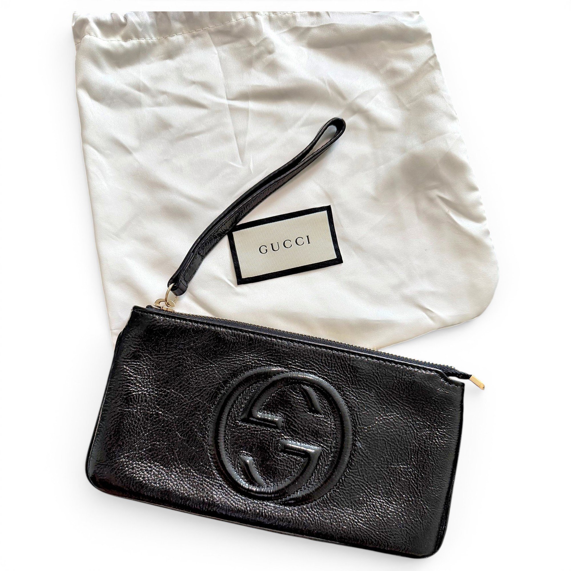 Soho patent leather clutch bag