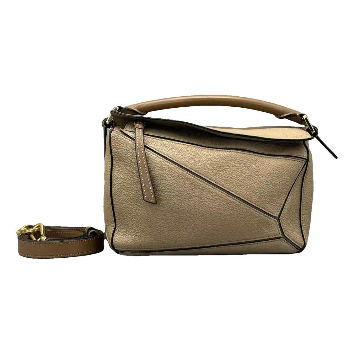 Puzzle leather handbag
