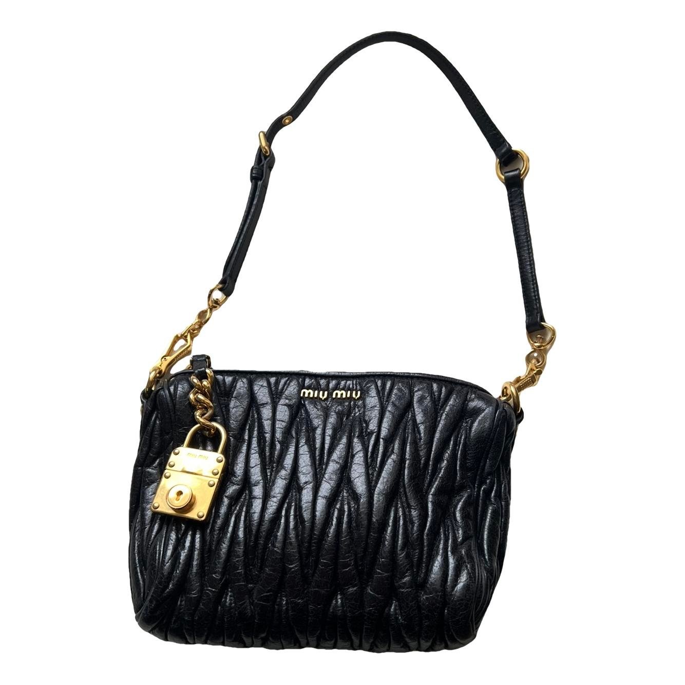 Matelassé leather clutch bag