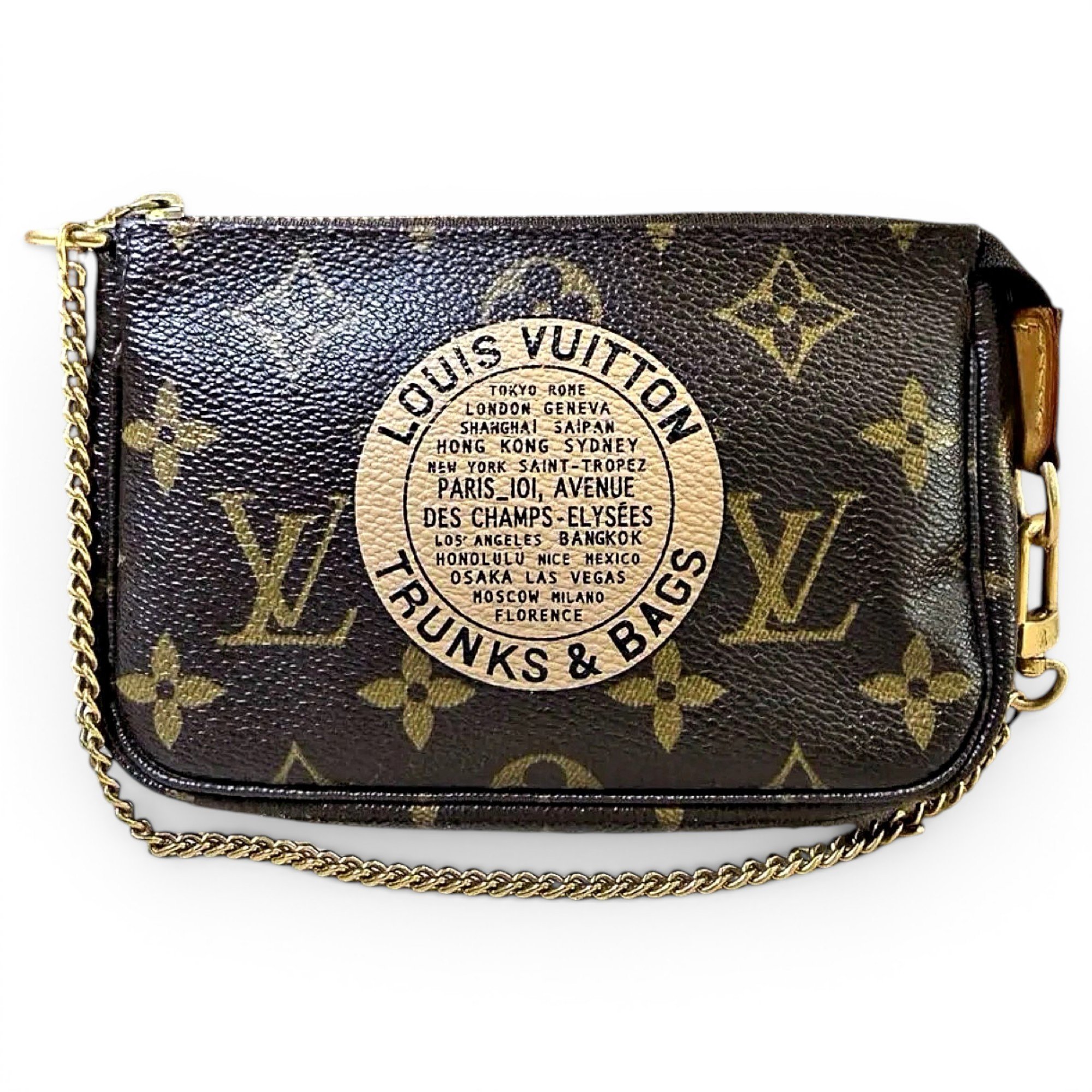 Pochette Accessoire vinyl handbag