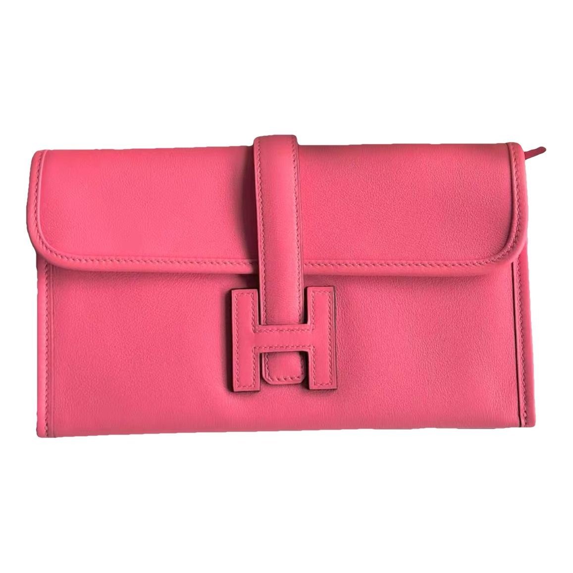 Jige leather clutch bag