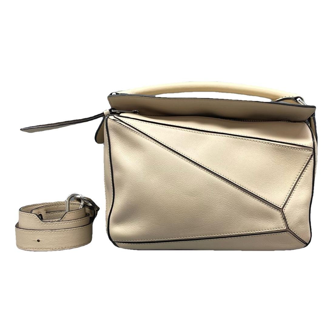 Puzzle leather handbag
