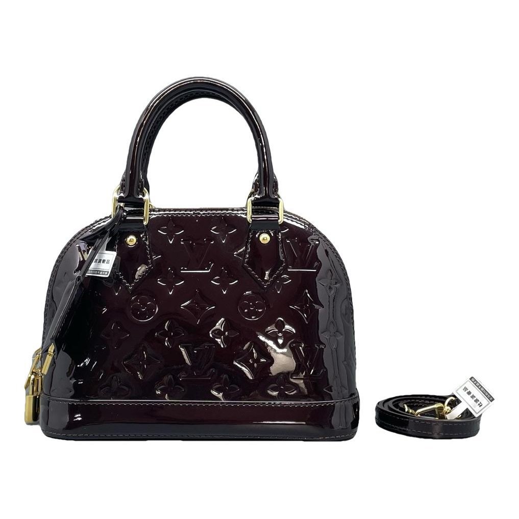 Louis Vuitton Alma BB leather handbag