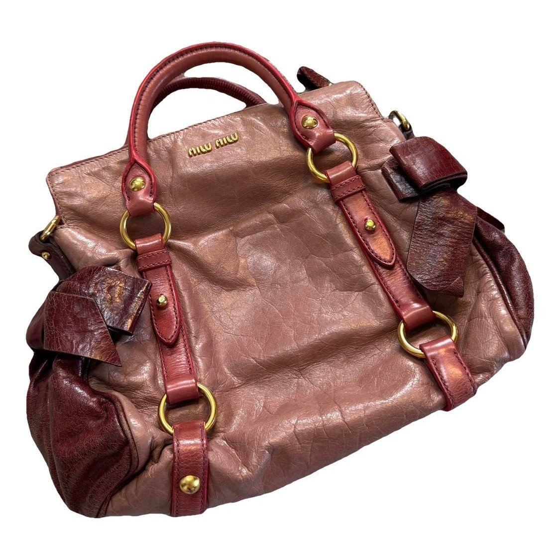 Bow bag leather handbag
