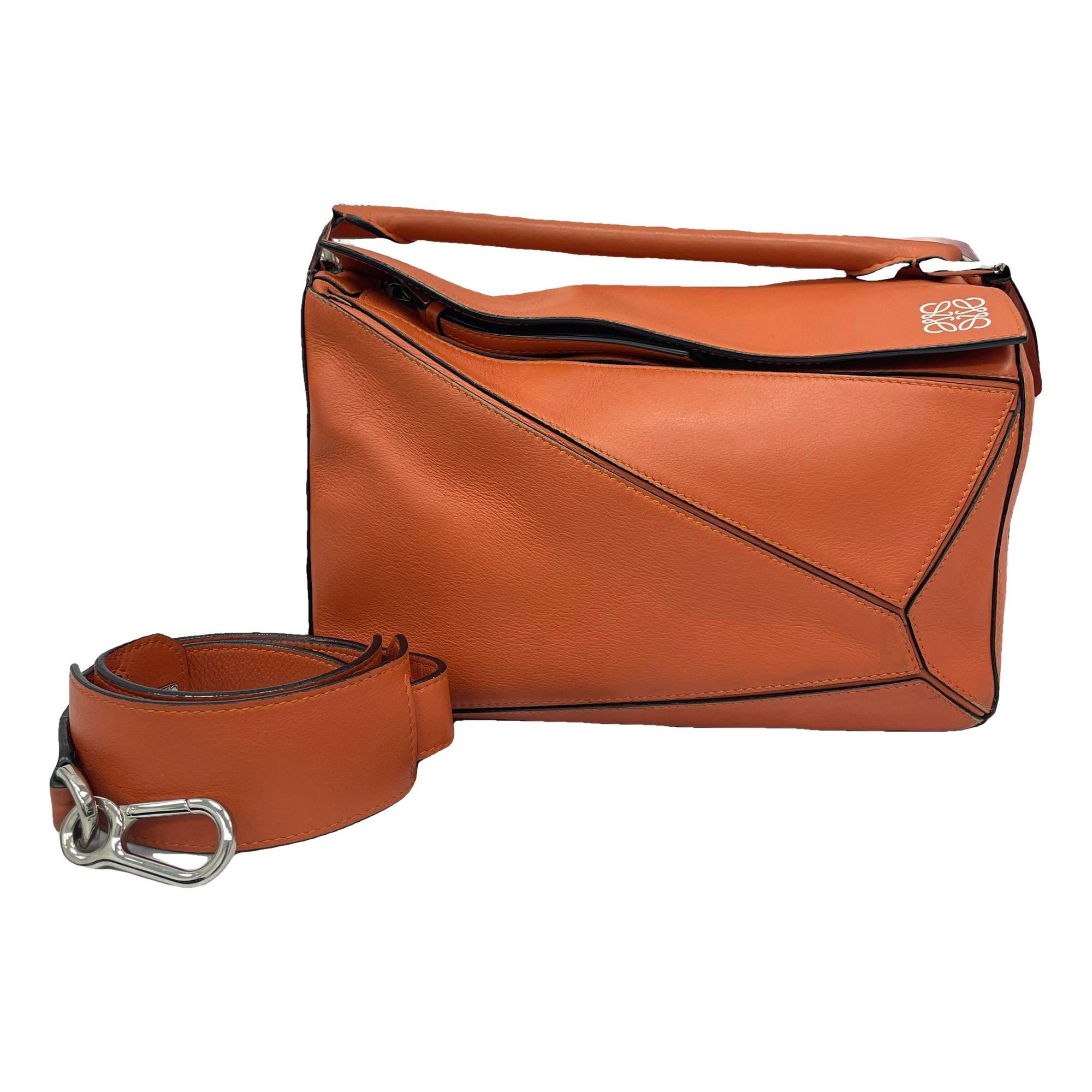 Puzzle leather handbag