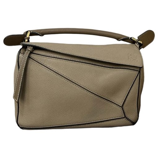 Puzzle leather handbag