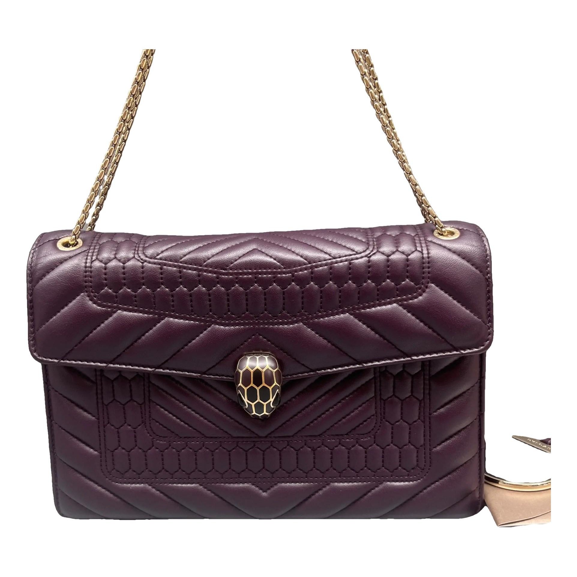 Serpenti leather handbag