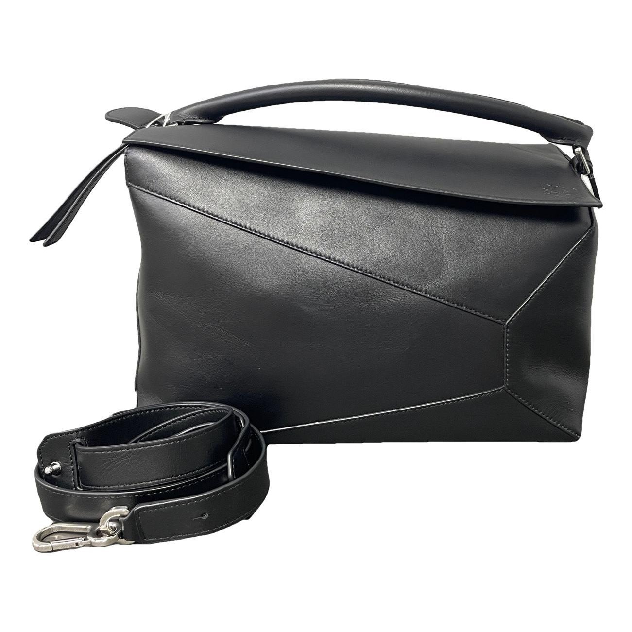 Puzzle leather handbag