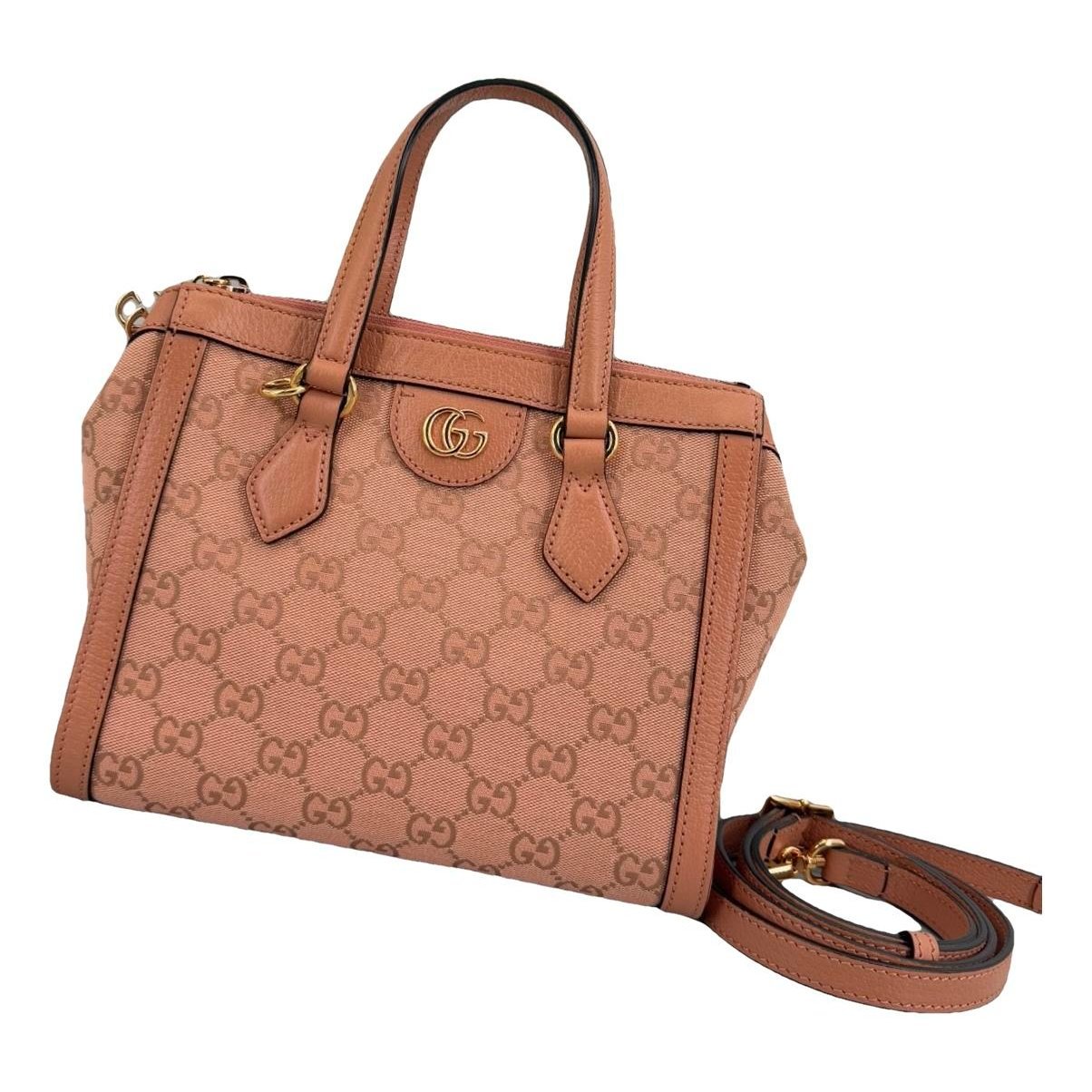 Ophidia Top Handle leather handbag
