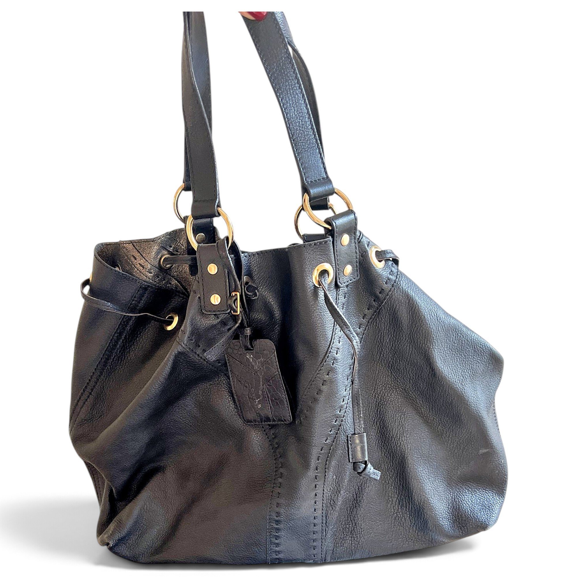 Monogram bucket leather handbag