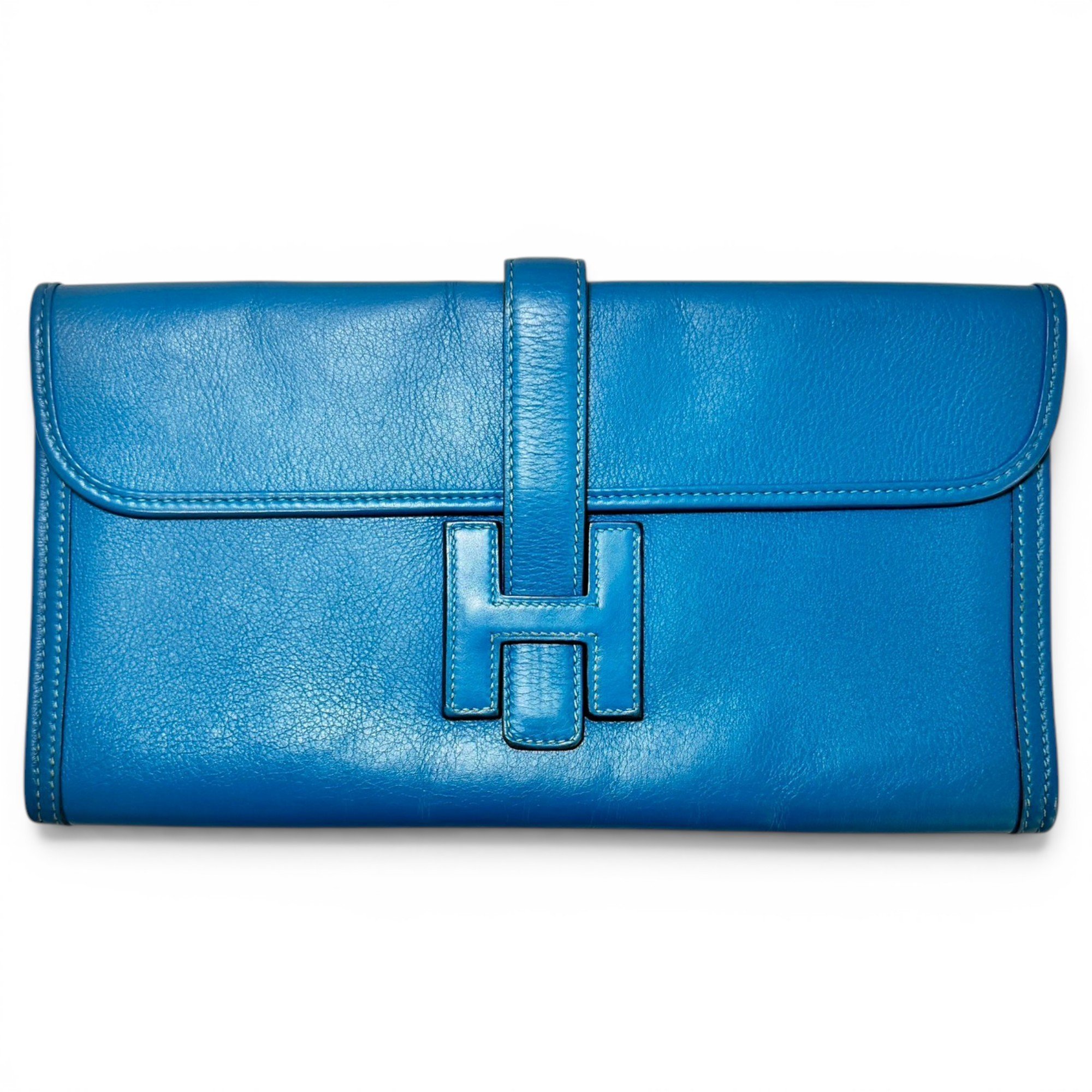 Jige leather clutch bag