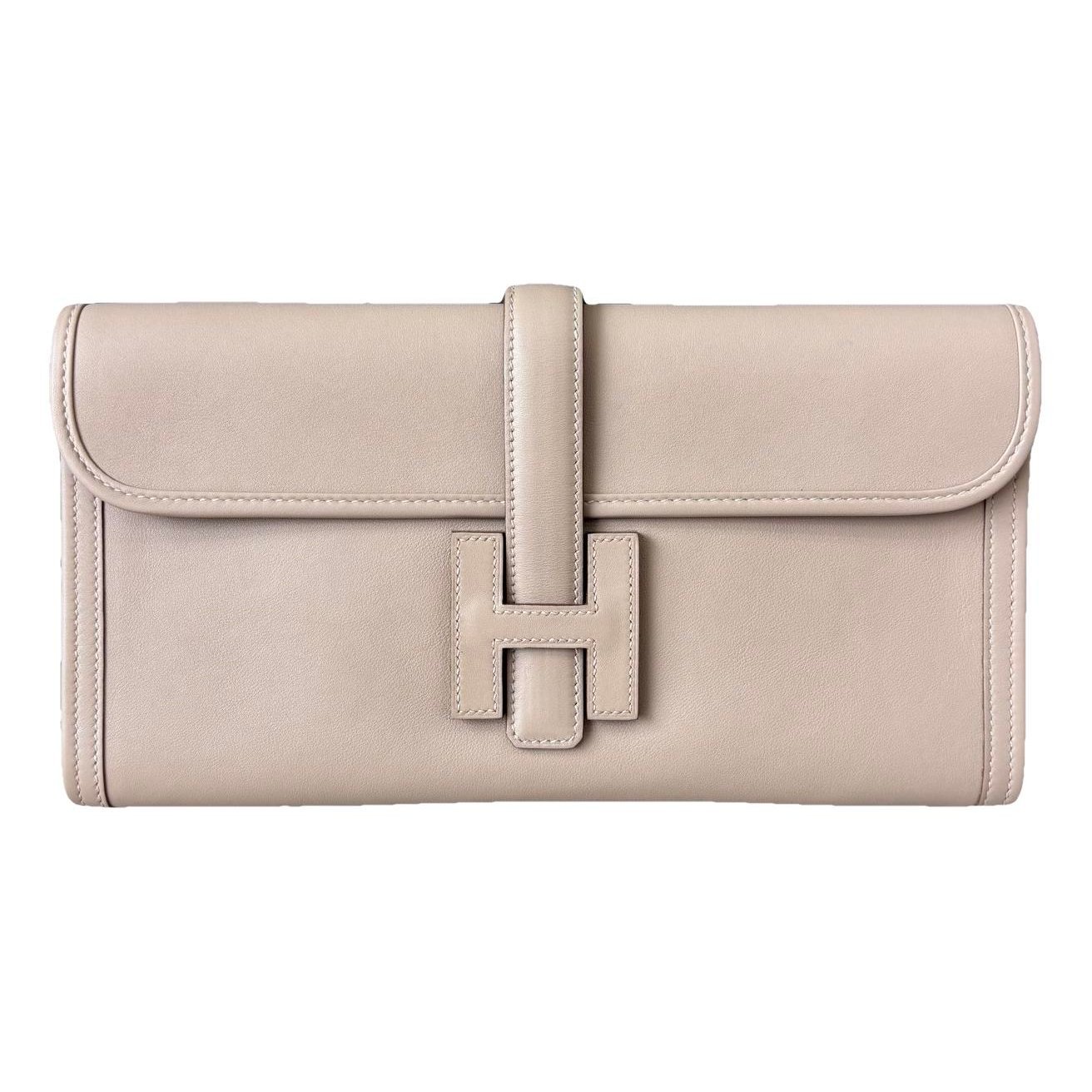 Jige leather clutch bag