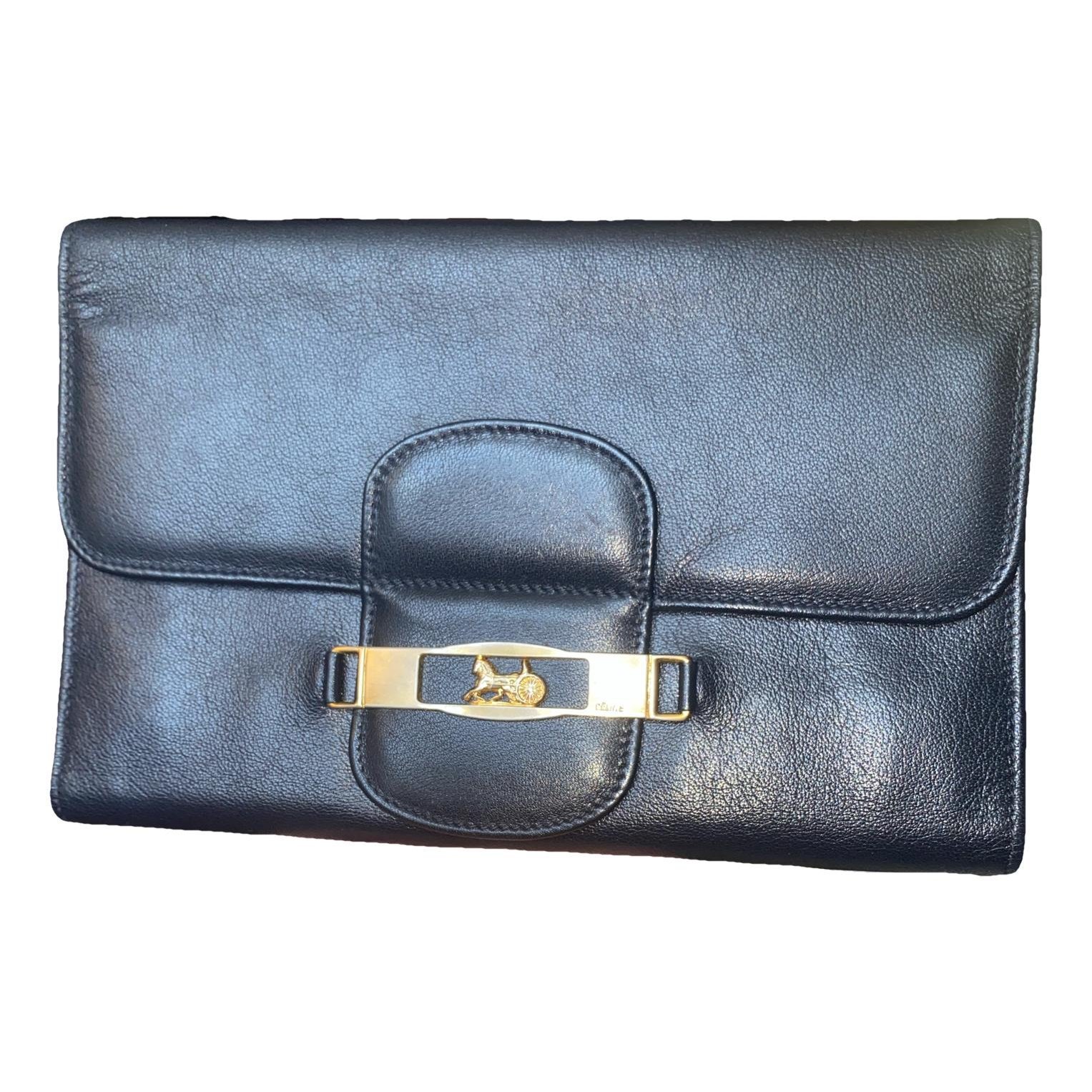 Triomphe Vintage leather clutch bag