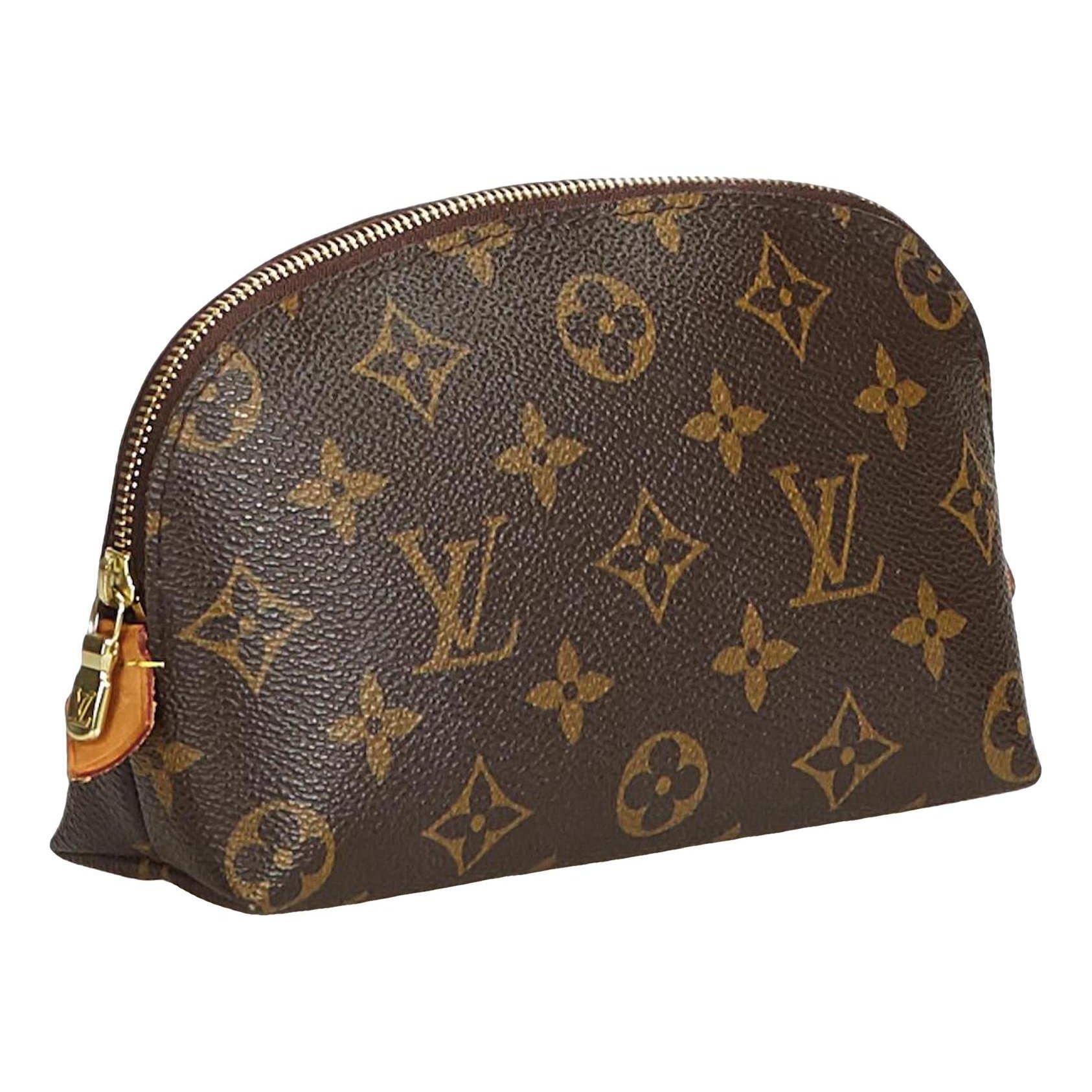 Louis Vuitton Neverfull leather clutch bag
