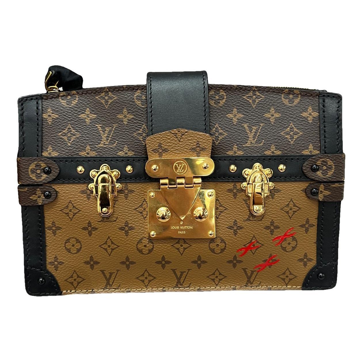 Pochette Trunk leather handbag