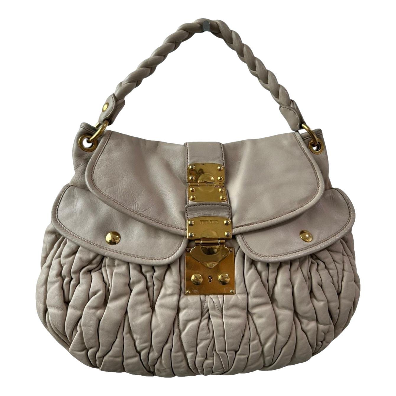 Coffer leather handbag