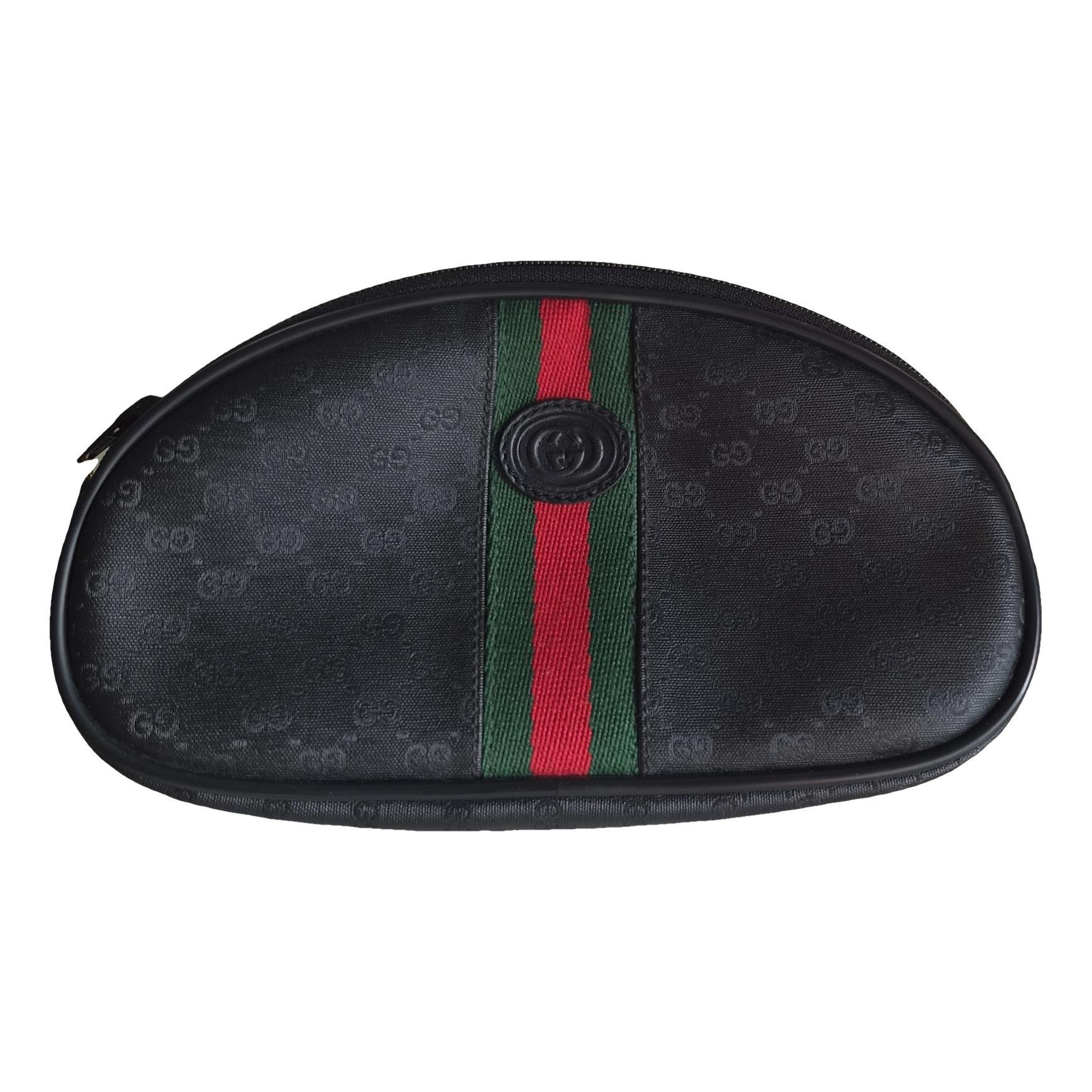 Ophidia cloth clutch bag