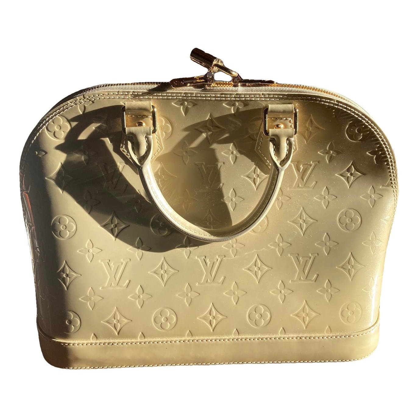Louis Vuitton Alma BB patent leather handbag