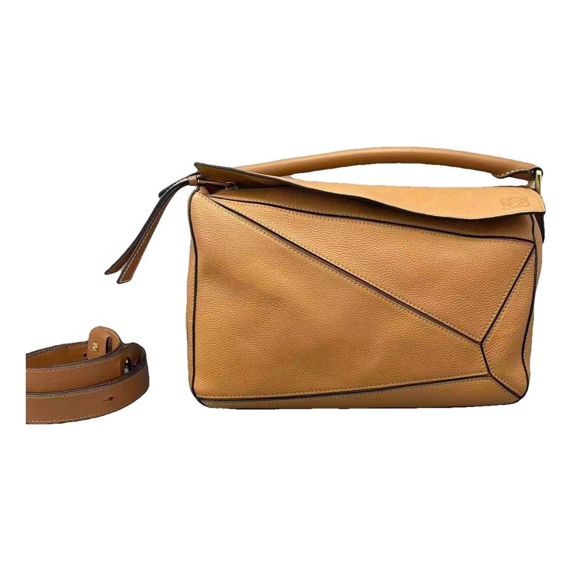 Puzzle leather handbag