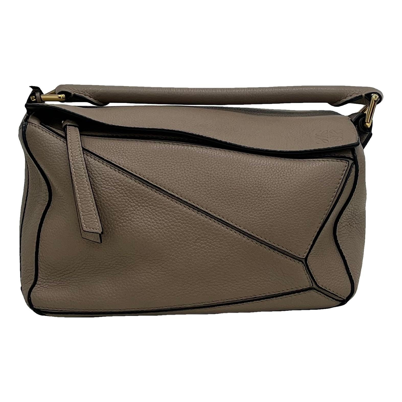 Puzzle leather handbag