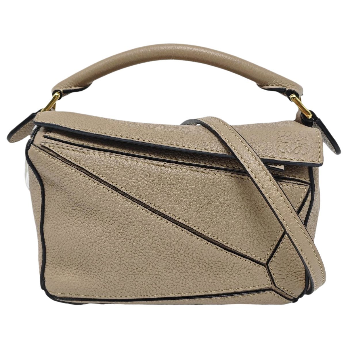 Puzzle leather handbag