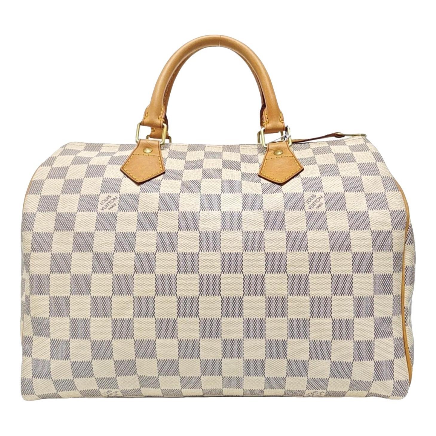 Nano Speedy / Mini HL leather handbag